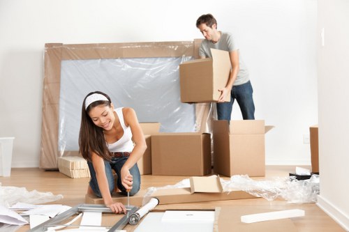 Removal team packing boxes for a house move in Scotland