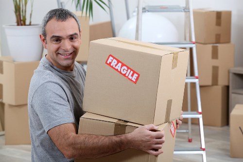 Person using a keyboard and screen reader while planning a removal service