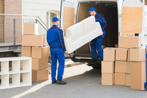 Careful unloading at a Cotland property by a removal van team