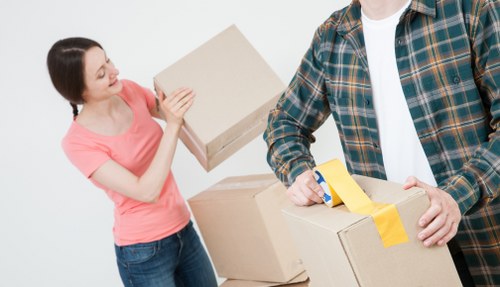 Professional movers loading items for a Cotland property relocation