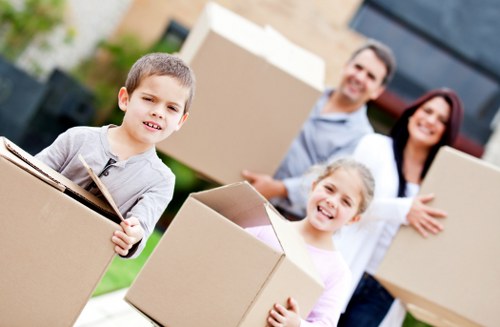 Local movers loading business equipment with care in Cotland