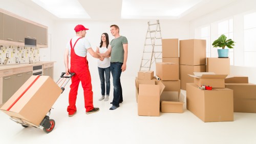 Commercial office movers handling furniture and boxes for a Cotland relocation