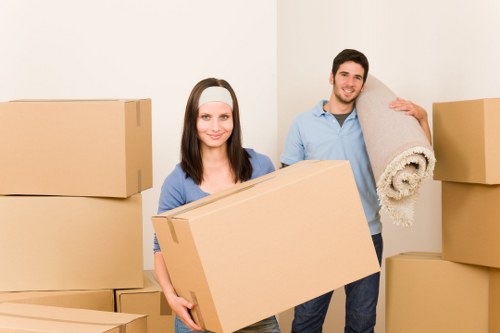 Commercial office move with boxes and desks prepared for loading