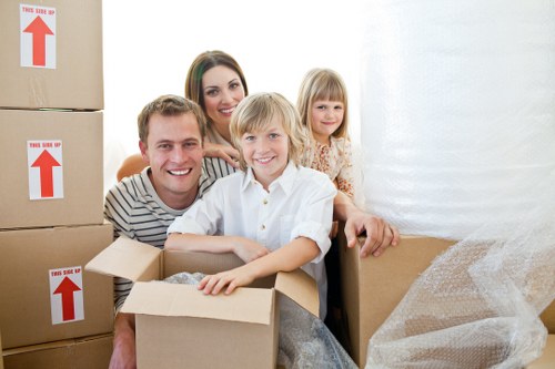 Local movers handling furniture loading in Cotland