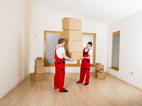 Office furniture and equipment being moved during a Cotland business relocation