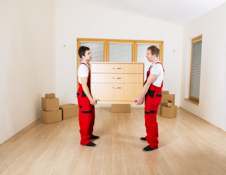 Removal team preparing furniture for a Cotland house move