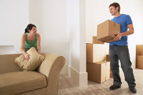 Careful packing of fragile household items for a move in Cotland